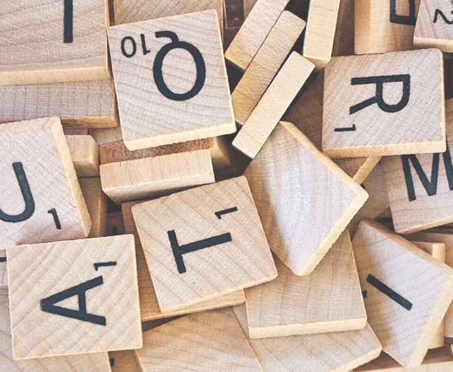 Content picture of wooden scrabble pieces